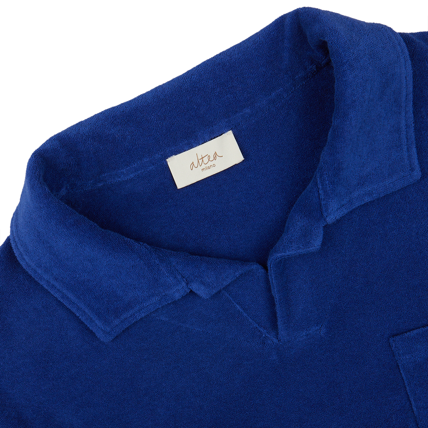 Close-up of a dark blue Altea Cotton Towelling Capri Collar Polo Shirt with a visible brand label on the collar.