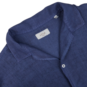 Close-up of an Altea Dark Blue Linen Blend Open Collar Shirt collar and label.