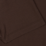 Close-up view of Altea's Dark Brown Cotton Jersey Capri Collar Polo Shirt with visible stitching detail.