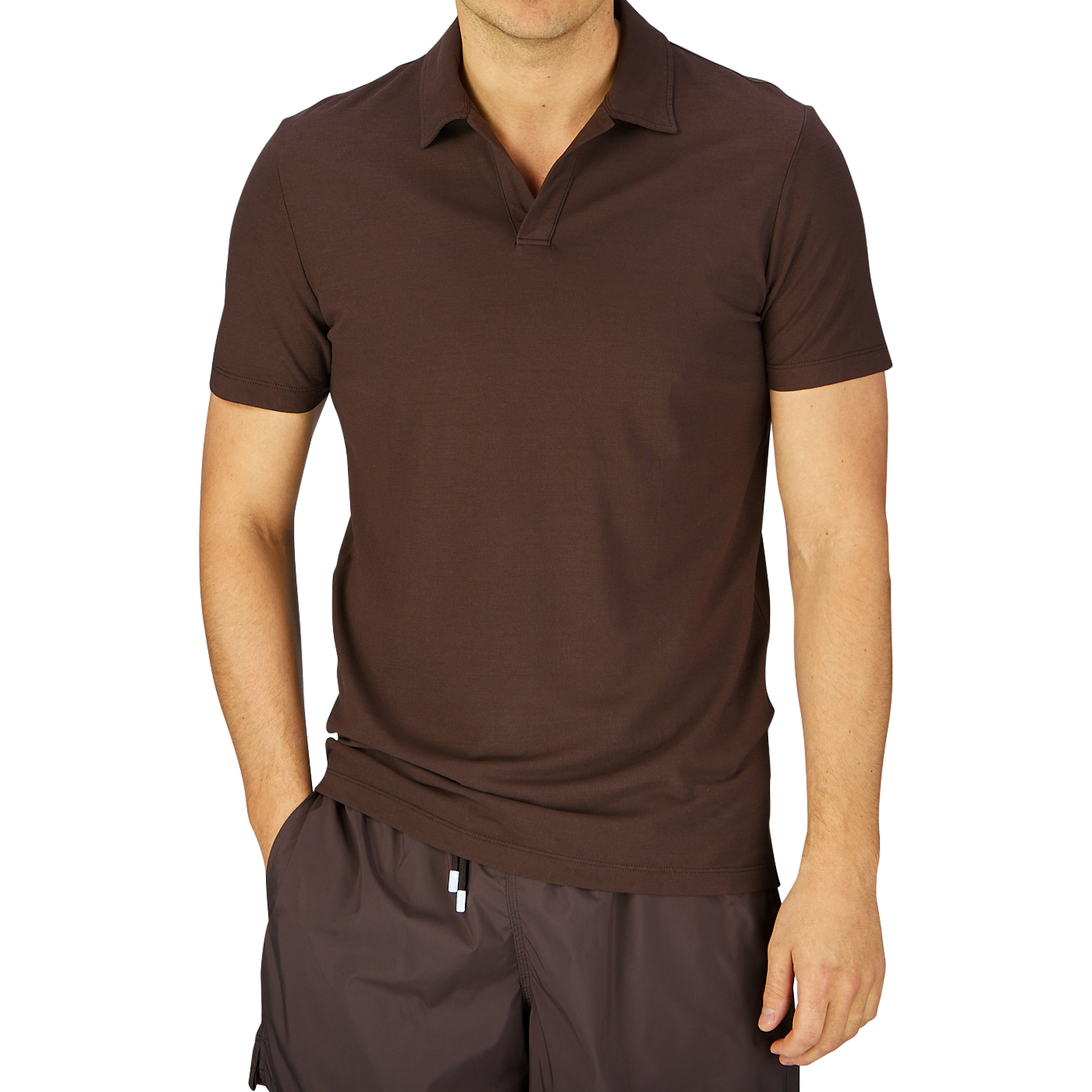 Man wearing an Altea dark brown cotton jersey capri collar polo shirt and dark shorts.