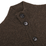 Close-up of the Dark Brown Shetland Wool Button Cardigan by Altea, featuring a ribbed collar and four black buttons along the front placket.