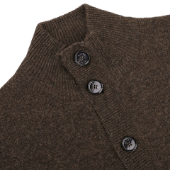 Close-up of the Dark Brown Shetland Wool Button Cardigan by Altea, featuring a ribbed collar and four black buttons along the front placket.