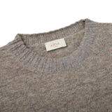 A seasonal Altea grey melange wool alpaca crewneck sweater with a label on it.