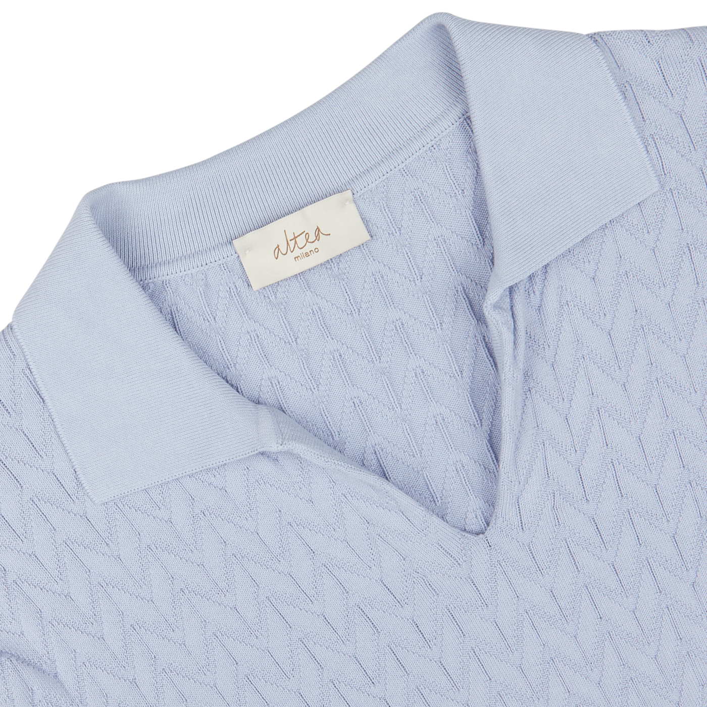 Light blue knitted sweater, made in Italy, with an Altea brand label at the neckline.