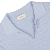 Light blue knitted sweater, made in Italy, with an Altea brand label at the neckline.