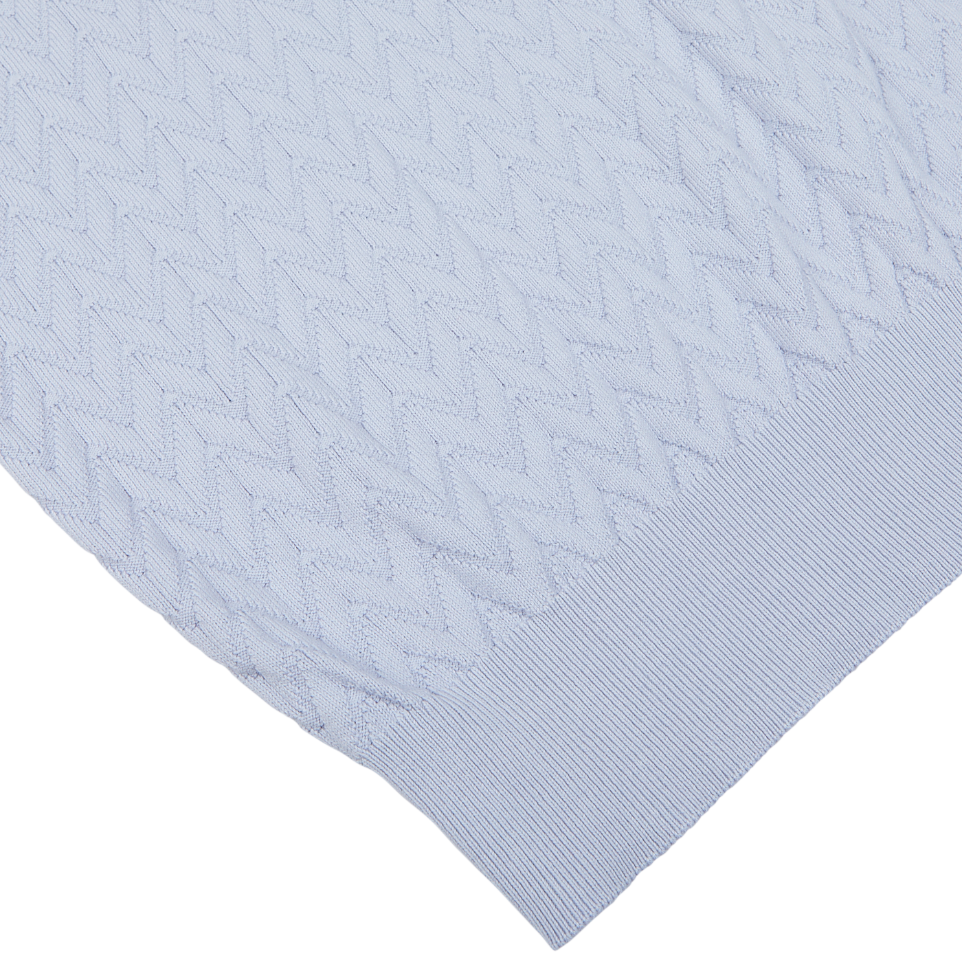 Light blue Altea pure cotton textured fabric overlaying a smooth white surface.