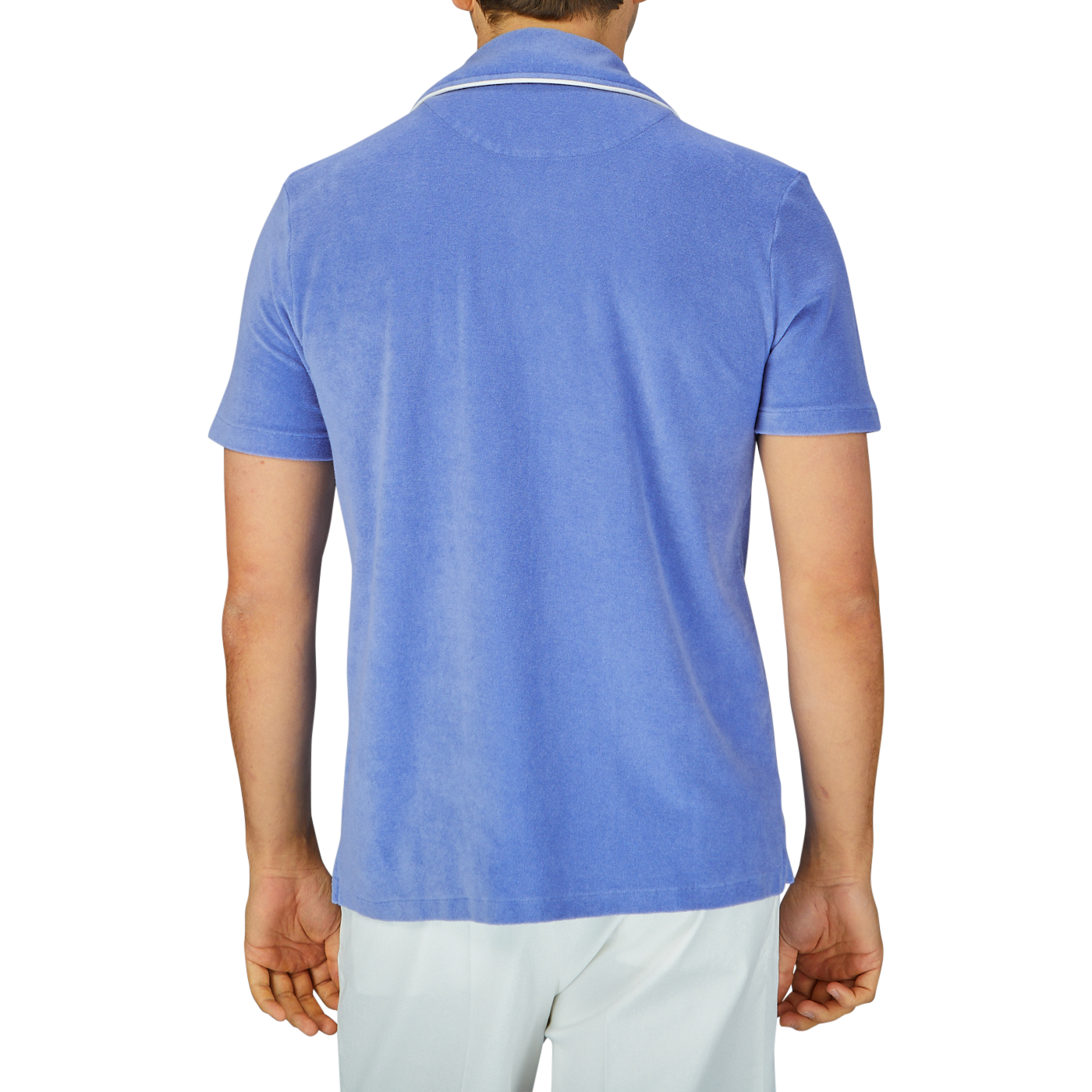 Man from behind wearing an Altea light blue cotton  Towelling Capri collar shirt and white trousers.