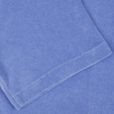 Close-up of a neatly folded Altea Light Blue Cotton Towelling Capri Collar Shirt with a visible texture.