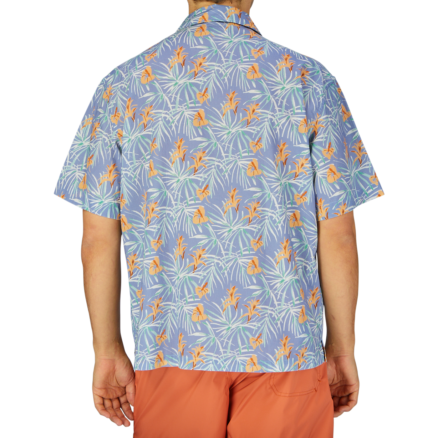 A person viewed from behind wearing an Altea light blue floral printed cotton shirt and orange shorts.
