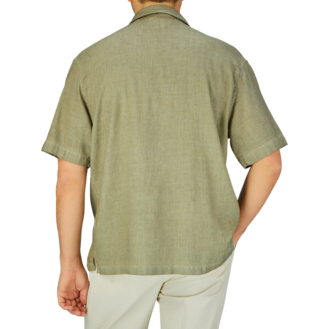 A man viewed from behind wearing an Altea Moss Green Linen Blend Camp Collar shirt and light-colored pants.