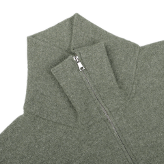 An up-close image of the Altea Moss Green Wool Fleece 1/4 Zip Sweater, showcasing its high collar and cozy wool blend construction.