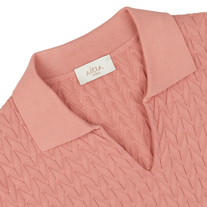 Close-up of a Muted Pink Cotton Capri Collar Polo Shirt with chevronne knit pattern and Altea label on the collar.