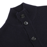 Close-up of the Altea Navy Blue Shetland Wool Button Cardigan, featuring a ribbed collar and three black buttons.