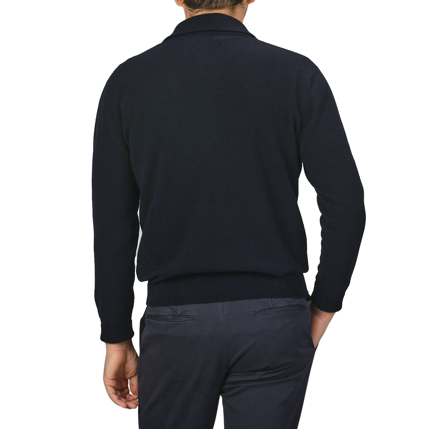 A person wearing an Altea Navy Blue Wool Fleece 1/4 Zip Sweater and dark pants, seen from behind, with their left hand partially visible.