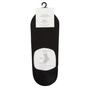 A pair of Amanda Christensen Black Cotton Invisible Socks with a white label.