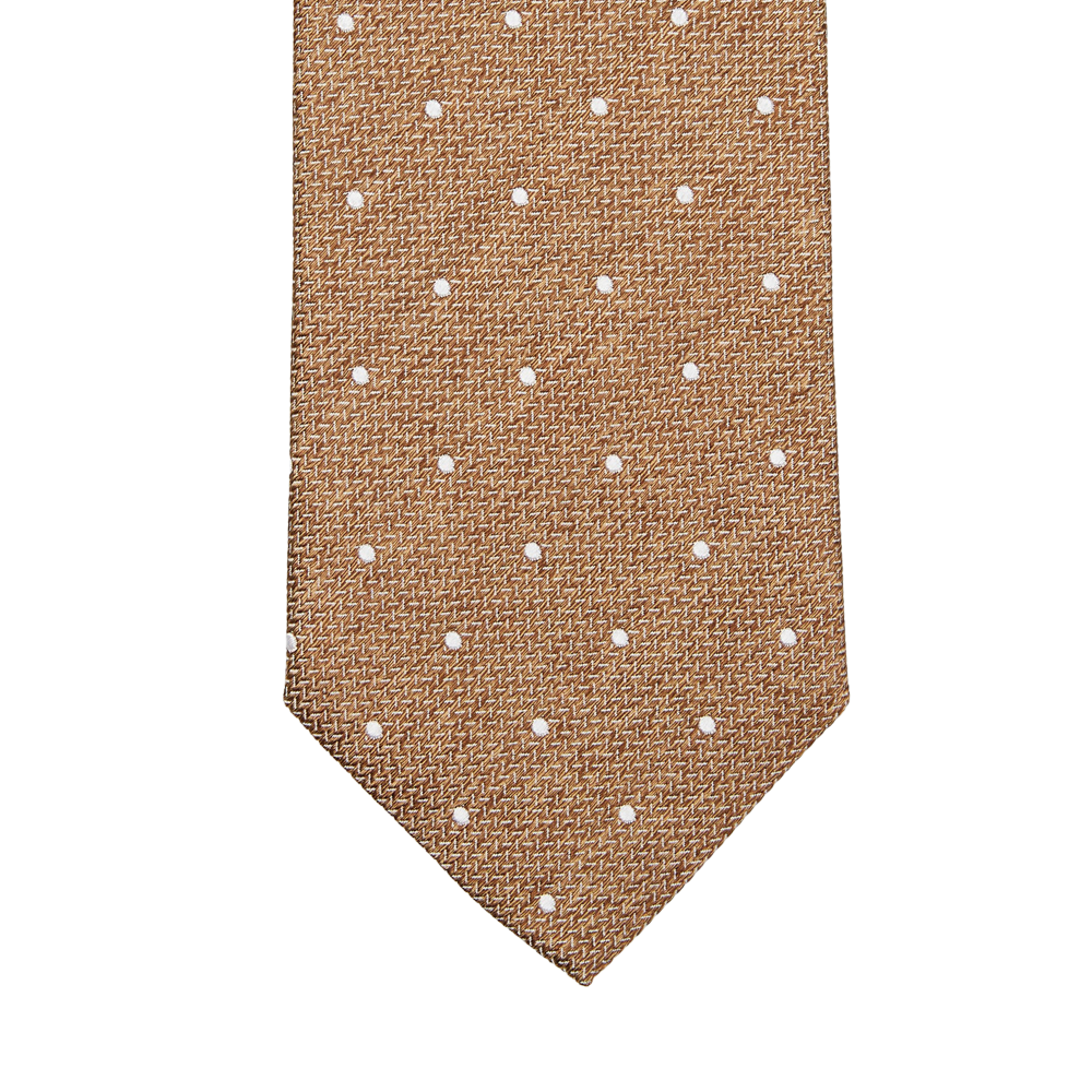 A Brown Dot Silk Lined Tie with white dots by Amanda Christensen.