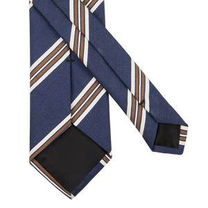 An Amanda Christensen dark blue striped silk cotton lined tie on a white background.