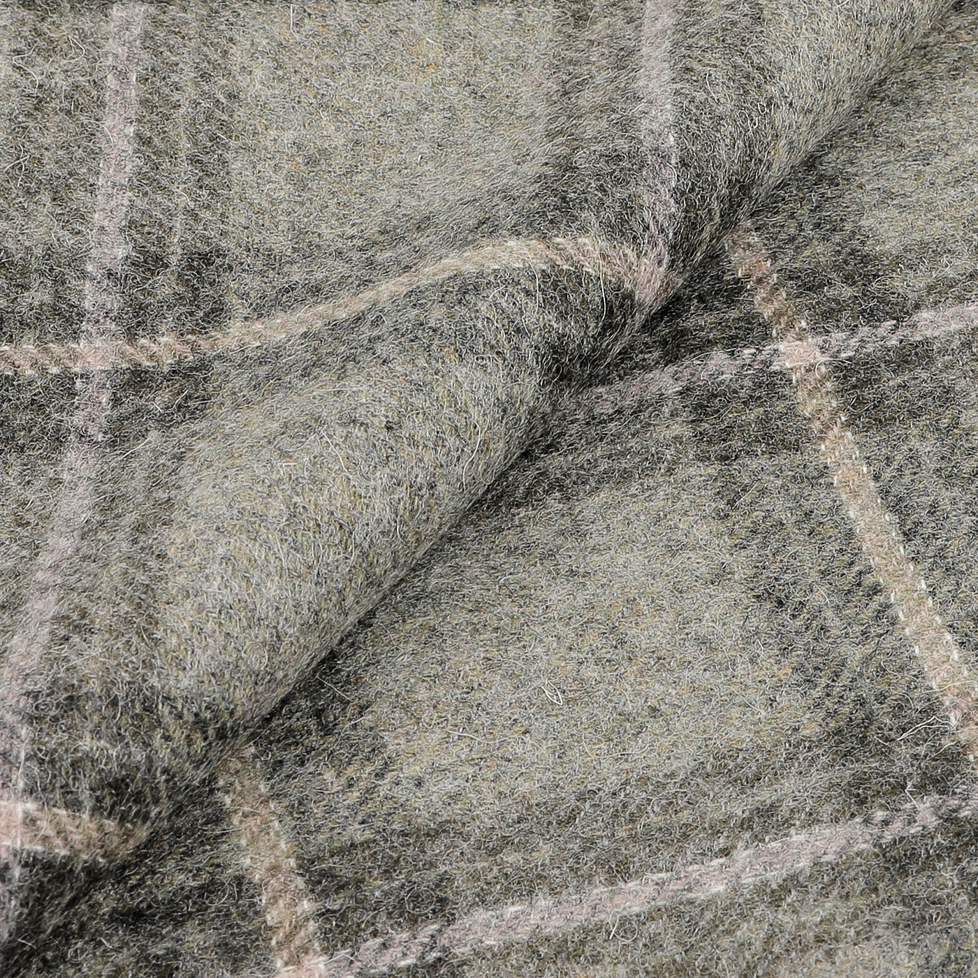 Close-up of an Amanda Christensen scarf, featuring merino wool fabric with a checkered pattern in shades of grey and green. The intersecting lines create a sophisticated grid-like design. This olive-beige checked Virgin Wool Scarf, made in Italy, exudes elegance and craftsmanship.