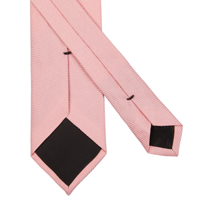 A close up of an Amanda Christensen Pink Matte Silk Lined Tie.