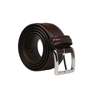 An Anderson's Dark Brown Calf Leather 35mm Belt with side stitches and a shiny silver buckle, positioned on a neutral background, exudes versatility.