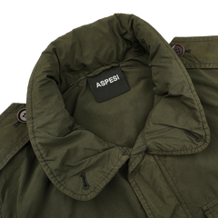 Aspesi's Army Green Luxury Nylon Field Jacket features a wide collar and button details, crafted with sleek nylon taffeta.