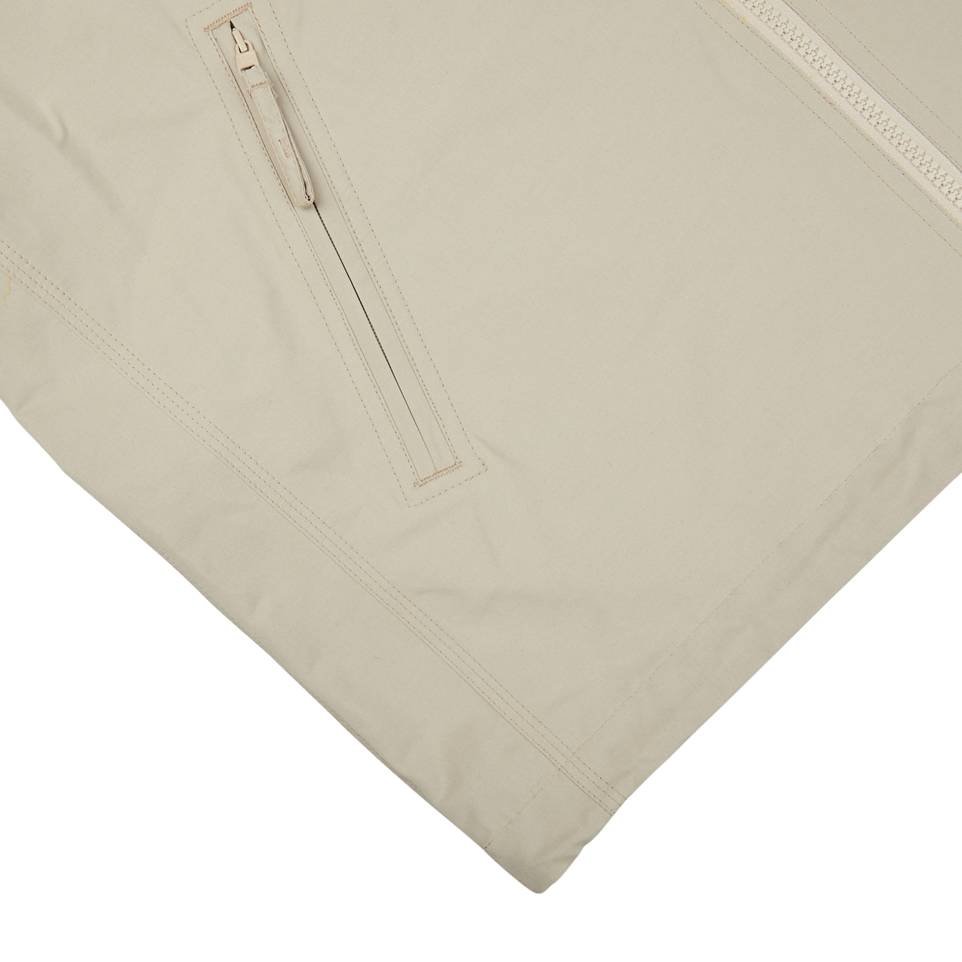 A beige Cotton Canvas Windbreaker Stringa jacket with zippers on the side by Aspesi.