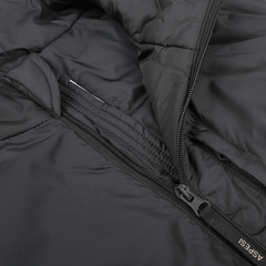 Close-up of an Aspesi jacket in black nylon taffeta, highlighting the stitching details and its ideal compatibility for layering with a Thermore Jil Gilet.