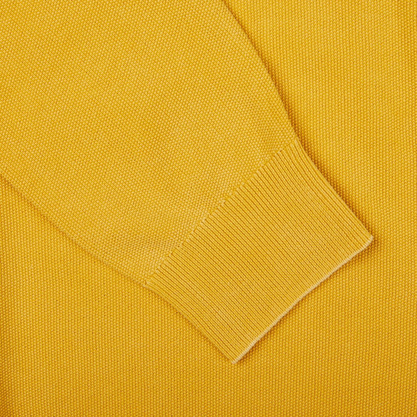 A close-up image of a Bright Yellow Cotton Piquet Crew Neck Sweater by Aspesi.