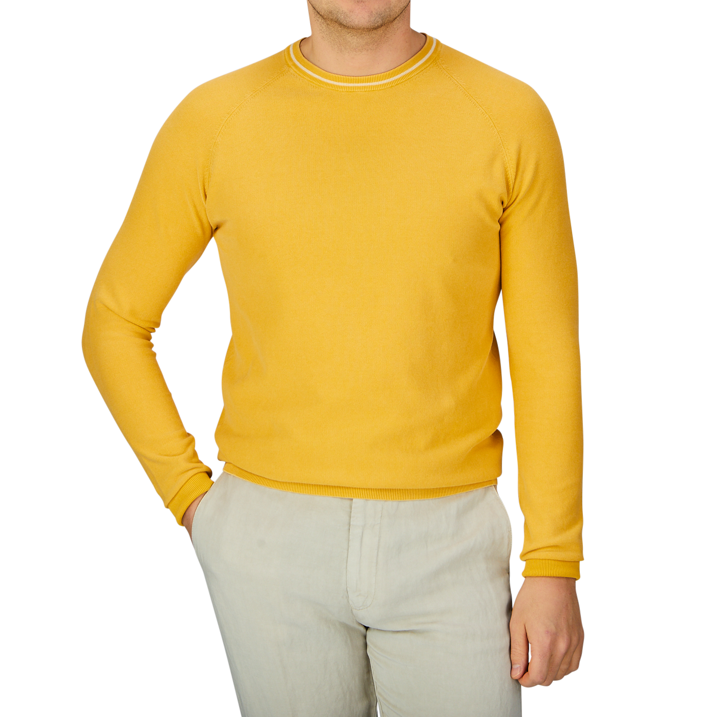 A man wearing a Bright Yellow Cotton Piquet Crew Neck Sweater by Aspesi and khaki pants.