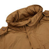 A tan Amber Brown Recycled Nylon Field Jacket with waterproof fabric, featuring a hood and cuffs from Aspesi.