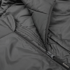 Close-up of a partially unzipped Charcoal Grey Nylon Taffetta Thermore Jil Gilet by Aspesi, highlighting its quilted fabric and stitching details, crafted from durable nylon taffeta for water-repellent protection.