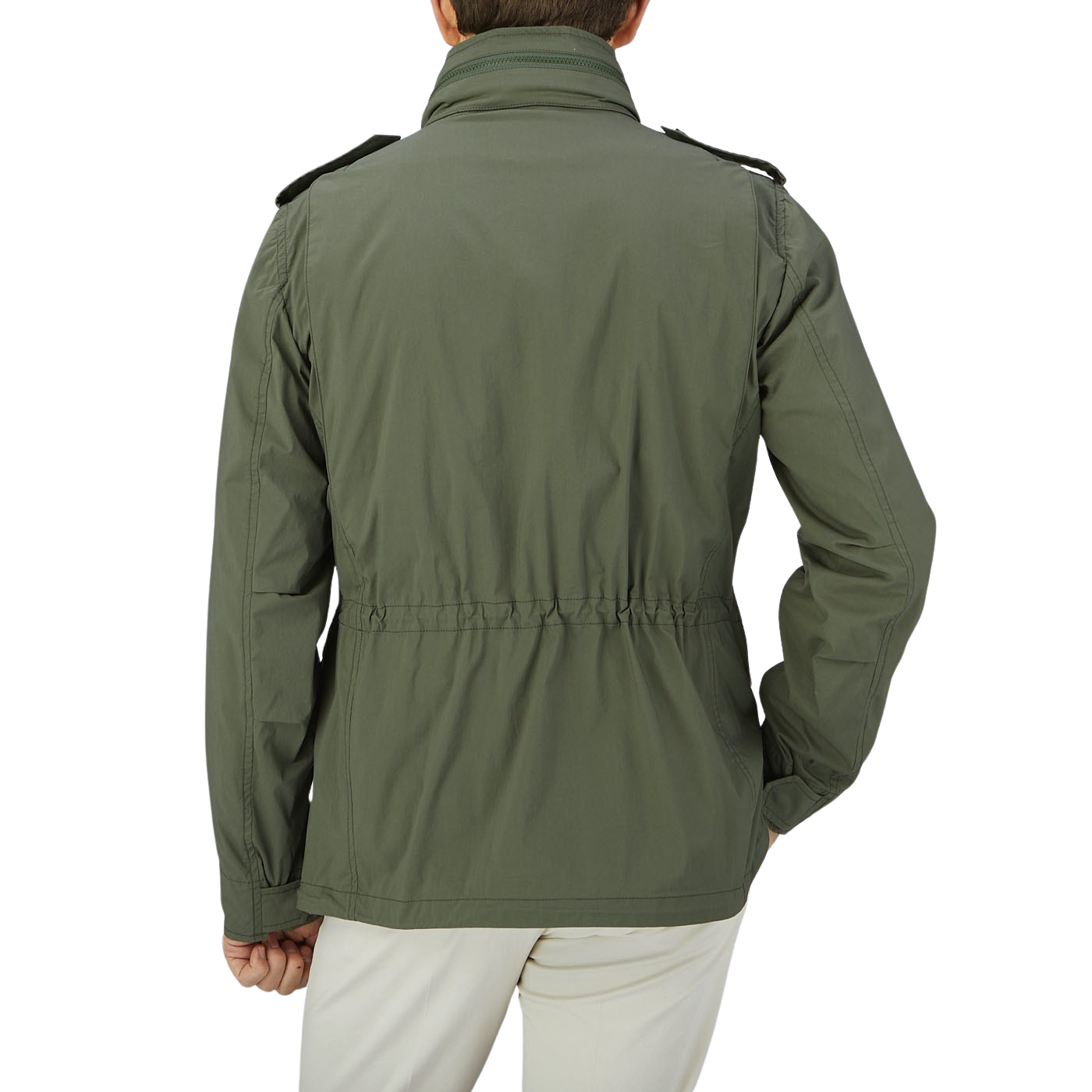 The back view of a man wearing an Aspesi M65 Field Jacket made from waterproof fabric.