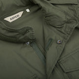 A close up of an Aspesi Green Cotton Nylon M65 Field Jacket made with waterproof fabric.