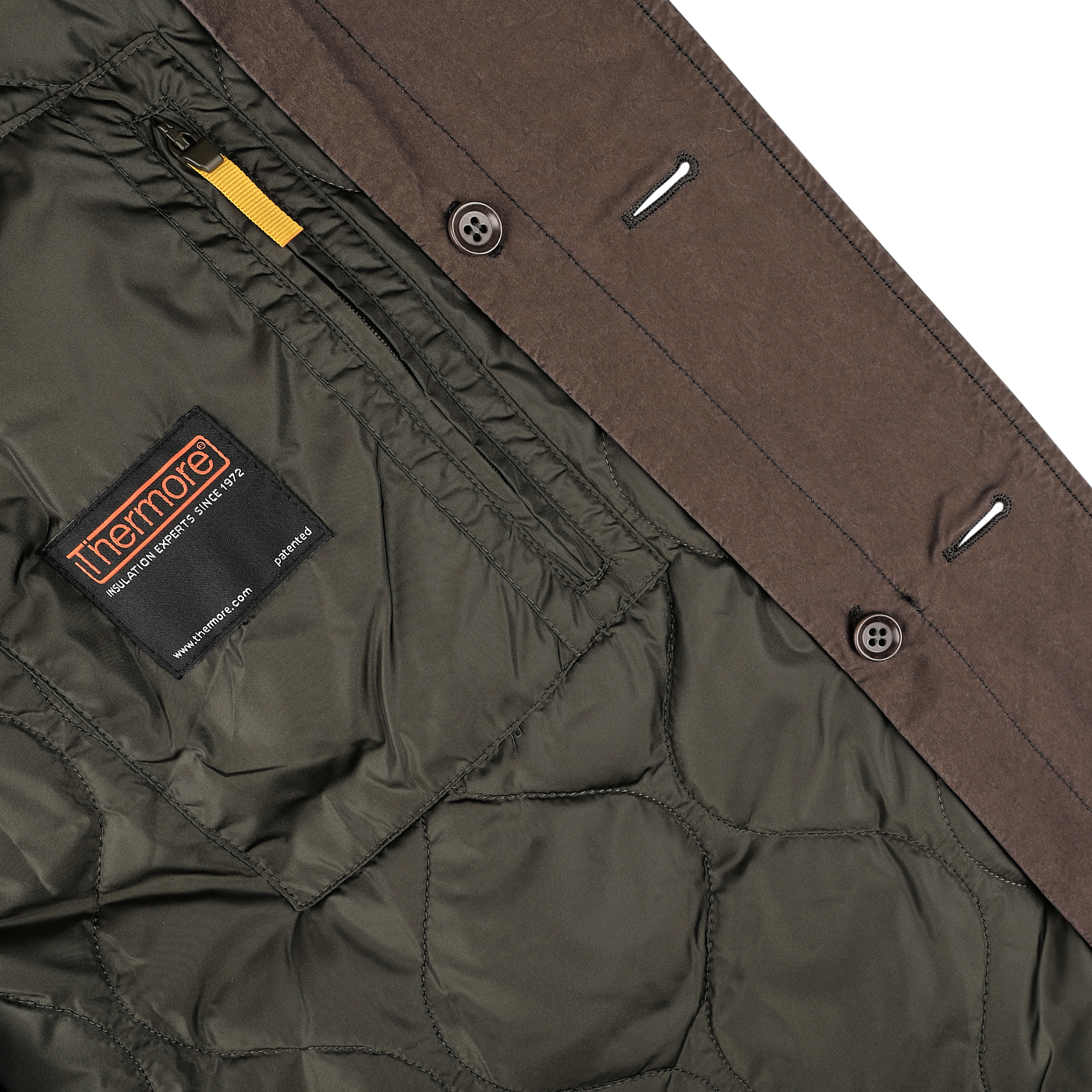 Close-up of the inside of an Aspesi Marrone Brown Micro Nylon Thermore Coat, showcasing the Thermore padding on the quilted lining and a contrast brown outer fabric with button details.