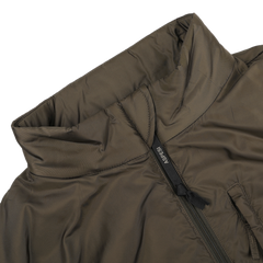 Close-up of a brown, high-collar puffer jacket made from nylon taffeta, featuring a zipper pull tab labeled "ASSISI." Its Thermore technical down ensures warmth and durability, similar to the Military Green Nylon Taffeta Thermore Jil Gilet by Aspesi.