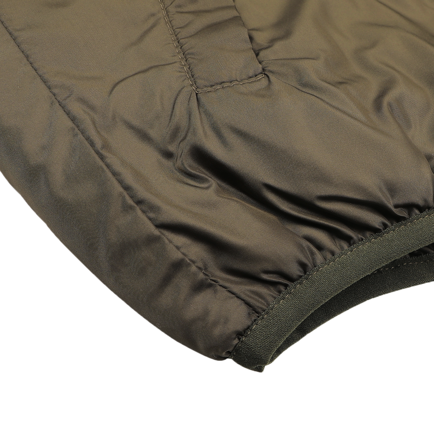 Close-up of the sleeve on the Aspesi Military Green Nylon Taffeta Thermore Jil Gilet, highlighting its visible stitching and elastic cuff. Made from high-quality nylon taffeta and featuring Thermore padding, it blends style with comfort for a contemporary look.