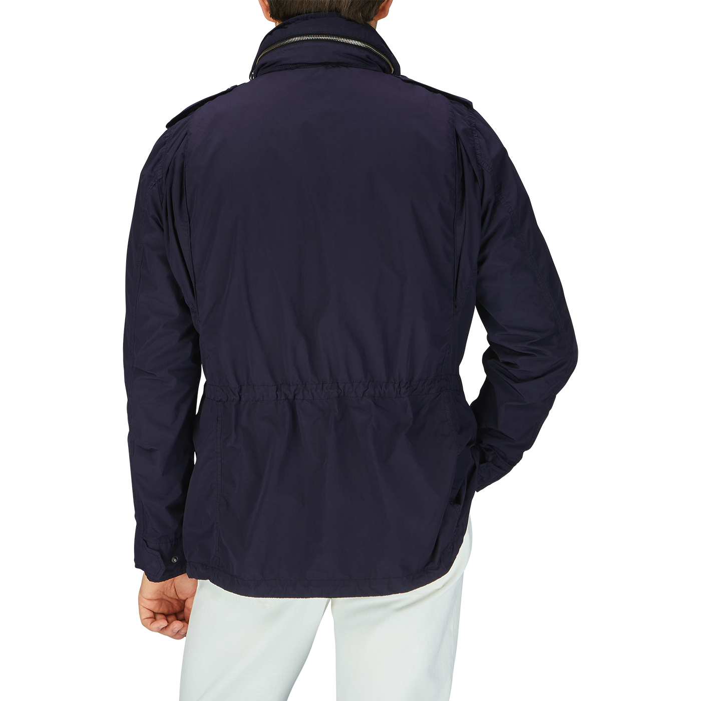 The man is wearing a Navy Blue Nylon Taffeta M65 field jacket by Aspesi with white pants.