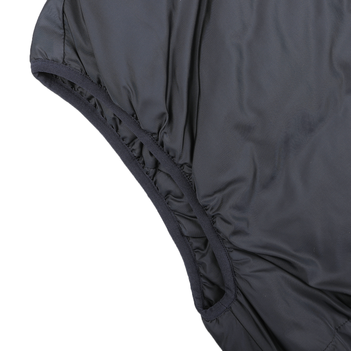 Close-up of a navy blue nylon taffeta fabric with ruched stitching, ideal for crafting a fashionable gilet by Aspesi.