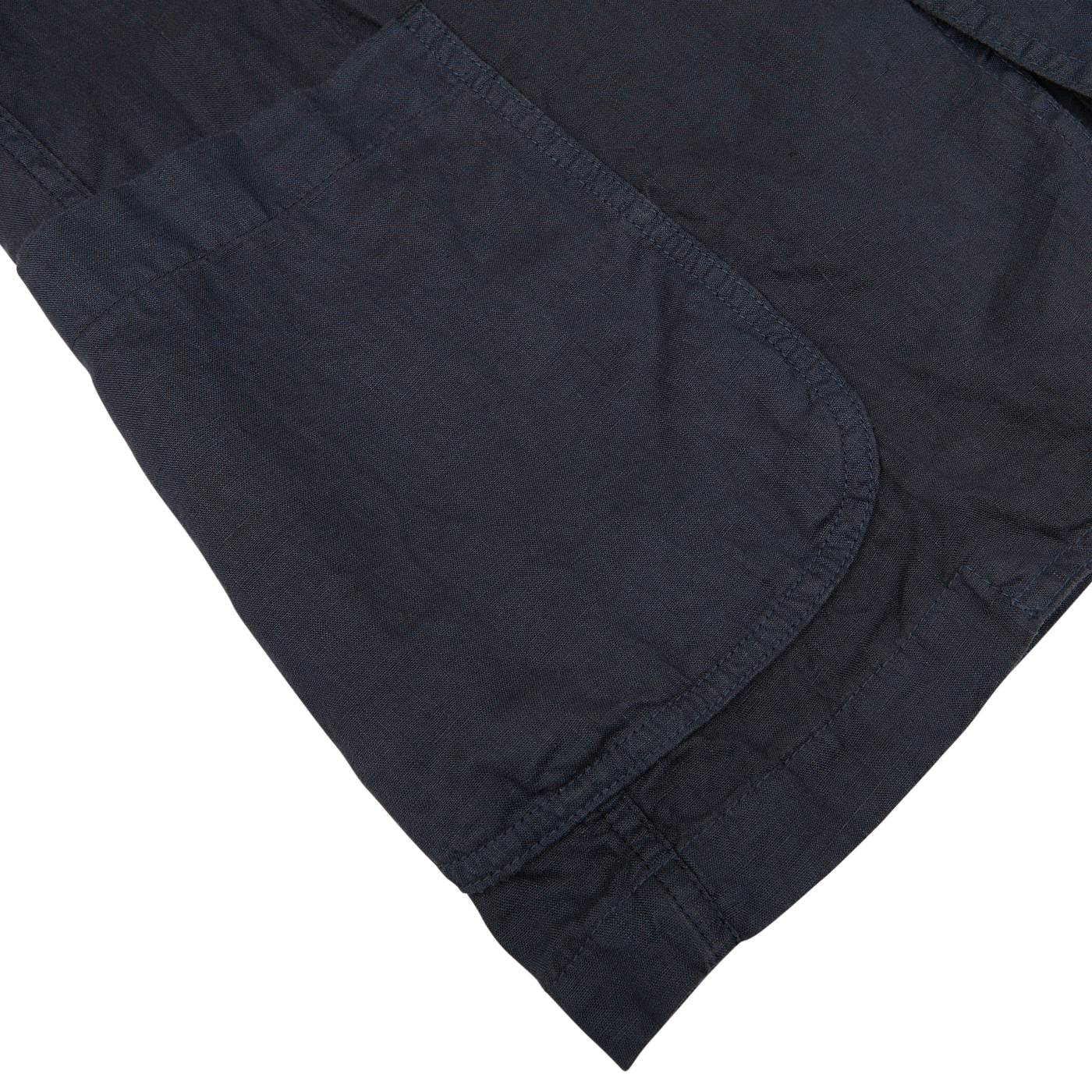 Close-up of a Navy Blue Washed Linen Samuraki Jacket fabric with detailed stitching, possibly a pocket of an Aspesi garment, on a white background.