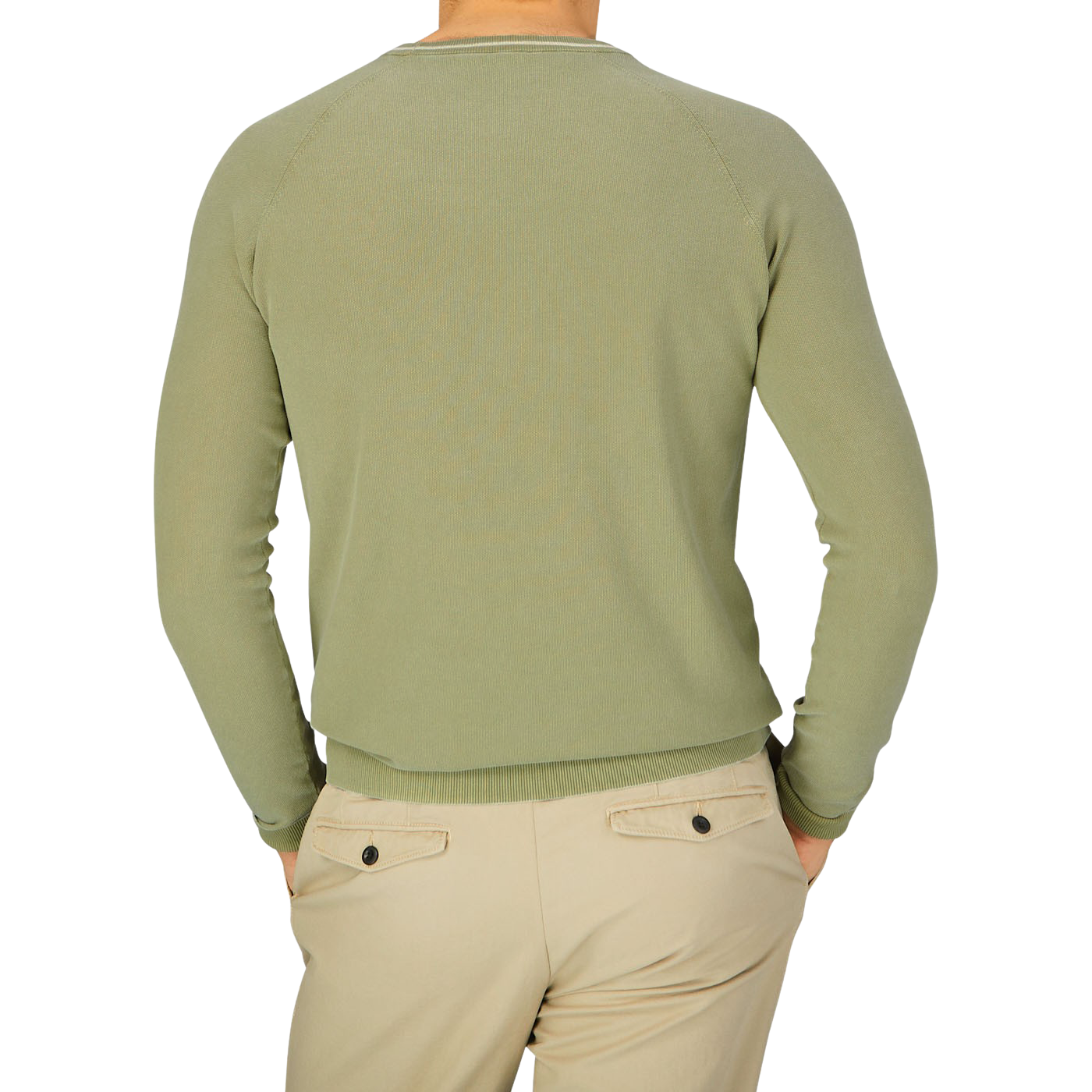 The back view of a man wearing an Aspesi Sage Green Cotton Piquet Crew Neck Sweater and khaki pants.