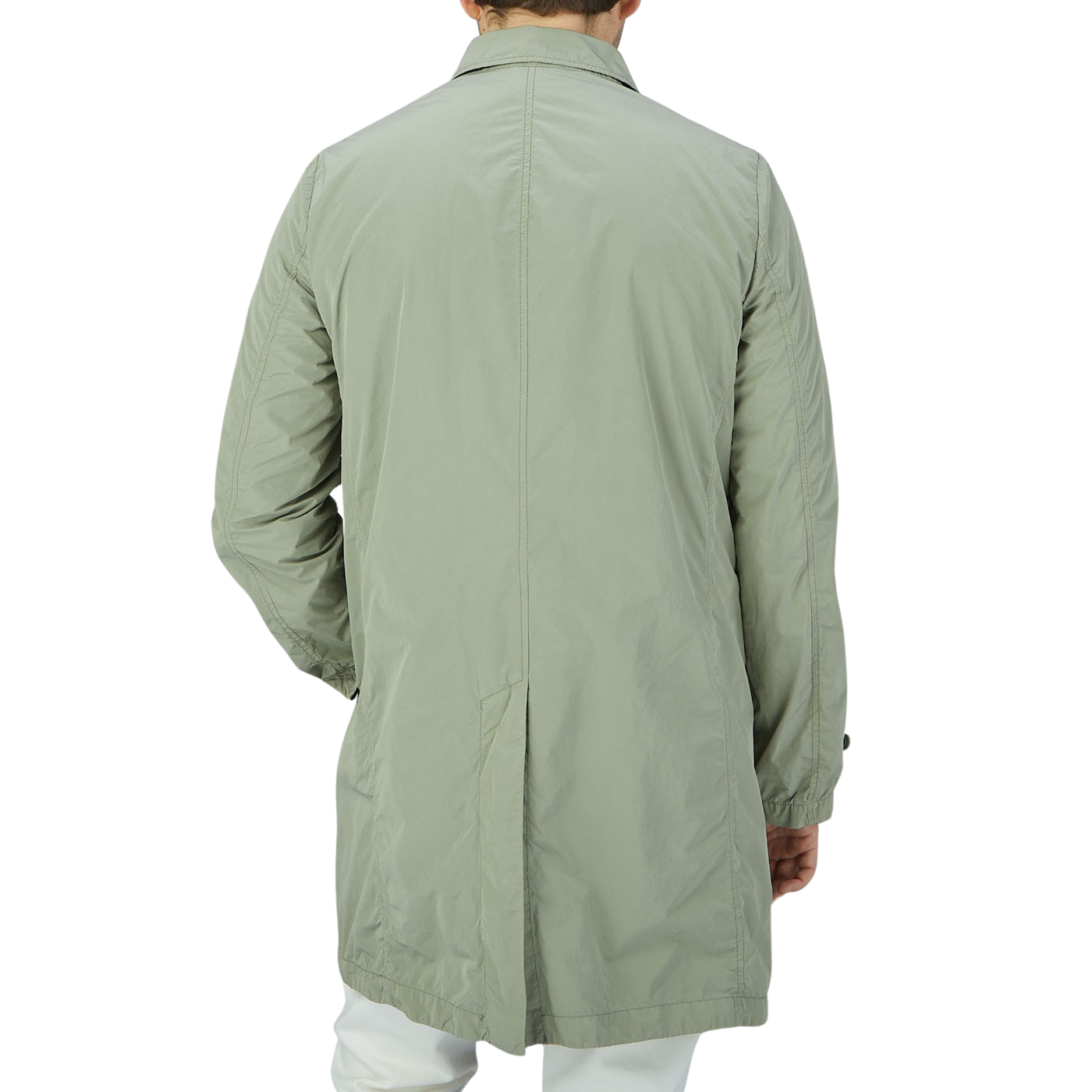 The back view of a man wearing an Aspesi Sage Green Micro Nylon Limone Coat.