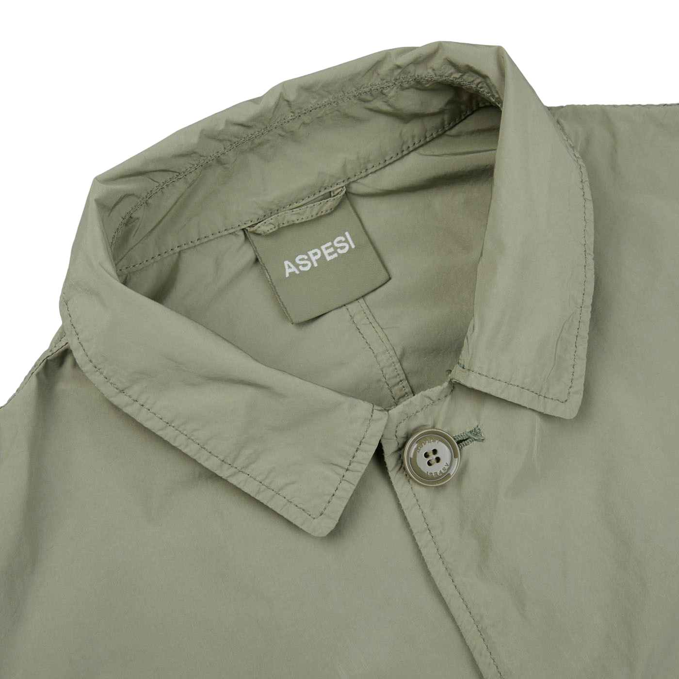 The back of a lightweight Aspesi Sage Green Micro Nylon Limone Coat with a button on the collar.