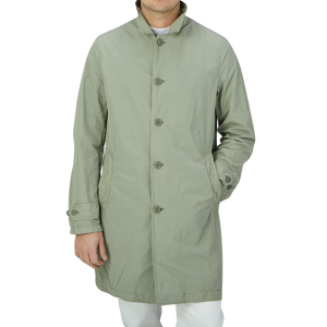 A man wearing an Aspesi Sage Green Micro Nylon Limone Coat.