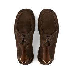 A pair of dark chestnut suede Beenflex derbies by Astorflex isolated on a transparent background.