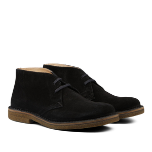 A pair of black Astorflex Greenflex Desert Boots with laces, shown against a transparent background.