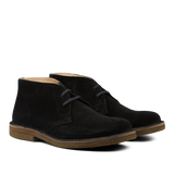 A pair of black Astorflex Greenflex Desert Boots with laces, shown against a transparent background.
