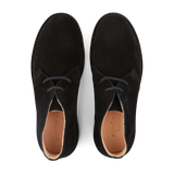 A pair of Astorflex Black Suede Greenflex Desert Boots men's dress shoes with laces, viewed from above.
