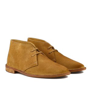 Astorflex's Cuoio Beige Suede Leather Buffalo Montflex Boots, crafted from Tuscan tanneries, showcase tan suede with laces and brown soles, captured beautifully from a side angle.