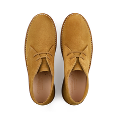 Top view of a pair of Cuoio Beige Suede Leather Buffalo Montflex boots by Astorflex, highlighting the craftsmanship of Tuscan tanneries on a white background.