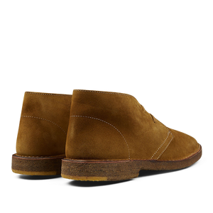 A pair of brown suede Astorflex desert boots.